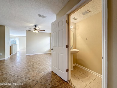 Location, lifestyle, and space come together in this spacious on Golf Club At Fleming Island in Florida - for sale on GolfHomes.com, golf home, golf lot