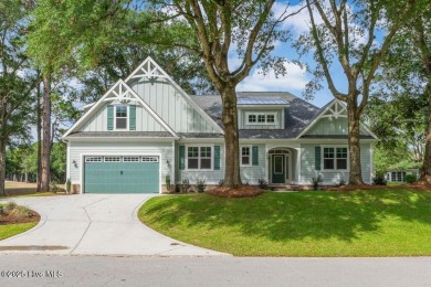 This brand new Riptide home with stunning setting and finishes on Sea Trail Golf Resort in North Carolina - for sale on GolfHomes.com, golf home, golf lot
