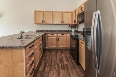 Situated on a desirable corner lot, this home offers added on Raindance National Golf Course in Colorado - for sale on GolfHomes.com, golf home, golf lot