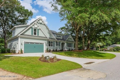 This brand new Riptide home with stunning setting and finishes on Sea Trail Golf Resort in North Carolina - for sale on GolfHomes.com, golf home, golf lot