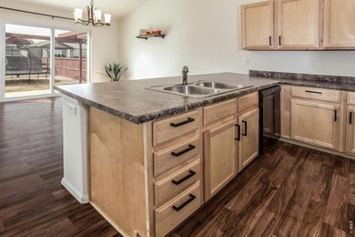 Situated on a desirable corner lot, this home offers added on Raindance National Golf Course in Colorado - for sale on GolfHomes.com, golf home, golf lot