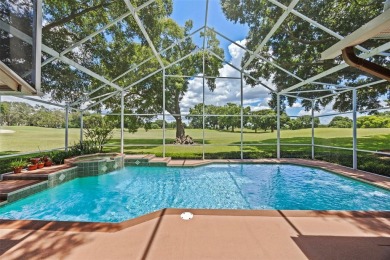 Impressive 4 bedroom, 3 bathroom golf front  home located on a on MetroWest Golf Club in Florida - for sale on GolfHomes.com, golf home, golf lot