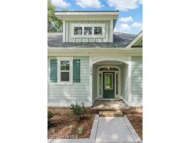 This brand new Riptide home with stunning setting and finishes on Sea Trail Golf Resort in North Carolina - for sale on GolfHomes.com, golf home, golf lot