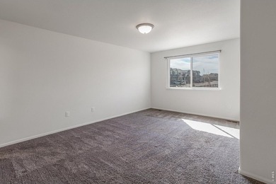 Situated on a desirable corner lot, this home offers added on Raindance National Golf Course in Colorado - for sale on GolfHomes.com, golf home, golf lot