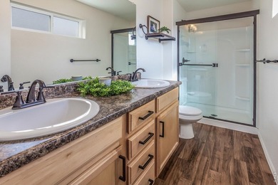 Situated on a desirable corner lot, this home offers added on Raindance National Golf Course in Colorado - for sale on GolfHomes.com, golf home, golf lot