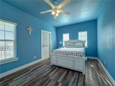 Come and enjoy this fun, colorful beach house in Mustang Royale on Palmilla Beach Golf Club in Texas - for sale on GolfHomes.com, golf home, golf lot