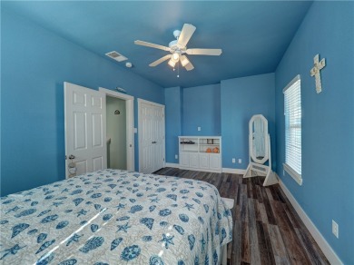 Come and enjoy this fun, colorful beach house in Mustang Royale on Palmilla Beach Golf Club in Texas - for sale on GolfHomes.com, golf home, golf lot