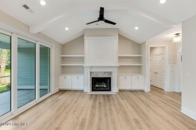 This brand new Riptide home with stunning setting and finishes on Sea Trail Golf Resort in North Carolina - for sale on GolfHomes.com, golf home, golf lot