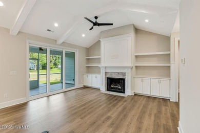 This brand new Riptide home with stunning setting and finishes on Sea Trail Golf Resort in North Carolina - for sale on GolfHomes.com, golf home, golf lot