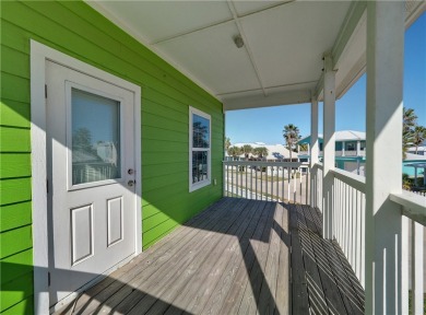 Come and enjoy this fun, colorful beach house in Mustang Royale on Palmilla Beach Golf Club in Texas - for sale on GolfHomes.com, golf home, golf lot