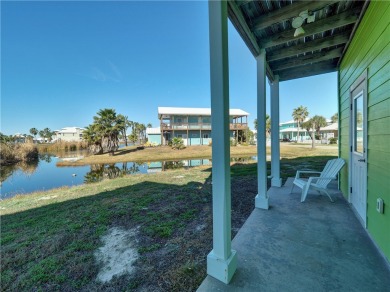 Come and enjoy this fun, colorful beach house in Mustang Royale on Palmilla Beach Golf Club in Texas - for sale on GolfHomes.com, golf home, golf lot
