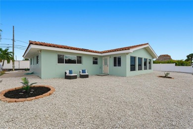 Welcome to your WATERFRONT dream home in the Pasadena Golf Club on Pasadena Yacht and Country Club in Florida - for sale on GolfHomes.com, golf home, golf lot