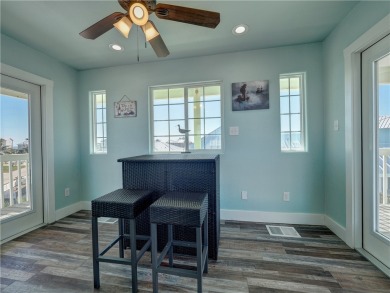 Come and enjoy this fun, colorful beach house in Mustang Royale on Palmilla Beach Golf Club in Texas - for sale on GolfHomes.com, golf home, golf lot