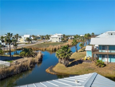 Come and enjoy this fun, colorful beach house in Mustang Royale on Palmilla Beach Golf Club in Texas - for sale on GolfHomes.com, golf home, golf lot
