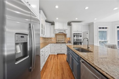Stunning 6-Bedroom Retreat in Sought-After Windward, one of on The Golf Club of Georgia in Georgia - for sale on GolfHomes.com, golf home, golf lot