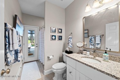 Live on the Green in Style! A refined residence in the on Jacksonville Golf and Country Club in Florida - for sale on GolfHomes.com, golf home, golf lot