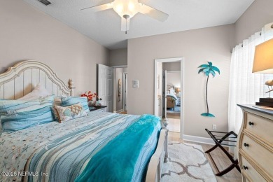 Live on the Green in Style! A refined residence in the on Jacksonville Golf and Country Club in Florida - for sale on GolfHomes.com, golf home, golf lot