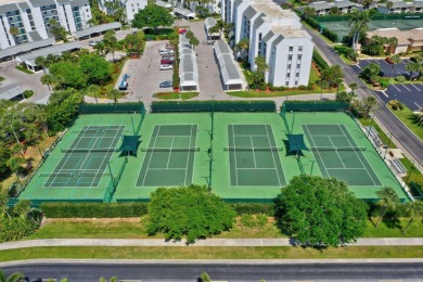 Enjoy resort style living in this charming 1 BR condo on Ocean Village Golf Course in Florida - for sale on GolfHomes.com, golf home, golf lot