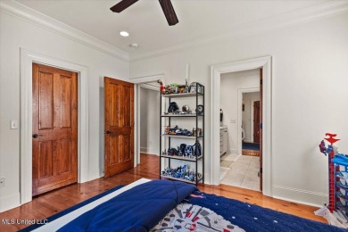 BOOK YOUR SHOWING NOW!!!Sitting atop a corner lot and backing up on Reunion Golf Club in Mississippi - for sale on GolfHomes.com, golf home, golf lot