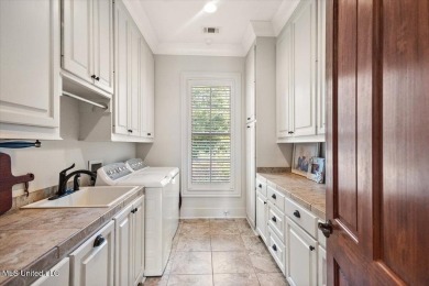 BOOK YOUR SHOWING NOW!!!Sitting atop a corner lot and backing up on Reunion Golf Club in Mississippi - for sale on GolfHomes.com, golf home, golf lot