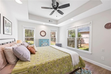 Stunning 6-Bedroom Retreat in Sought-After Windward, one of on The Golf Club of Georgia in Georgia - for sale on GolfHomes.com, golf home, golf lot