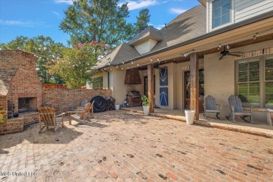 BOOK YOUR SHOWING NOW!!!Sitting atop a corner lot and backing up on Reunion Golf Club in Mississippi - for sale on GolfHomes.com, golf home, golf lot