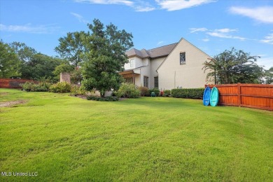 BOOK YOUR SHOWING NOW!!!Sitting atop a corner lot and backing up on Reunion Golf Club in Mississippi - for sale on GolfHomes.com, golf home, golf lot