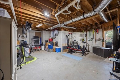Stunning 6-Bedroom Retreat in Sought-After Windward, one of on The Golf Club of Georgia in Georgia - for sale on GolfHomes.com, golf home, golf lot