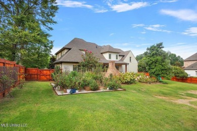 BOOK YOUR SHOWING NOW!!!Sitting atop a corner lot and backing up on Reunion Golf Club in Mississippi - for sale on GolfHomes.com, golf home, golf lot