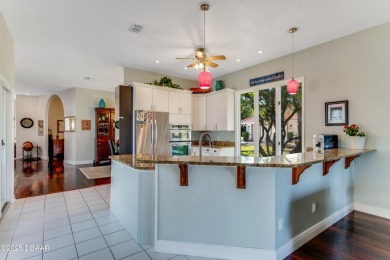 Welcome to this timeless and well-loved 3-bedroom, 2-bathroom on Plantation Bay Golf and Country Club in Florida - for sale on GolfHomes.com, golf home, golf lot