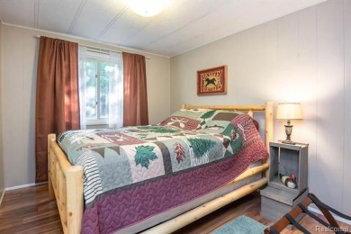 This well cared for ranch style home at Lost Lake Woods Club on Lost Lake Woods Club in Michigan - for sale on GolfHomes.com, golf home, golf lot