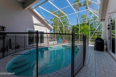 Welcome to this timeless and well-loved 3-bedroom, 2-bathroom on Plantation Bay Golf and Country Club in Florida - for sale on GolfHomes.com, golf home, golf lot