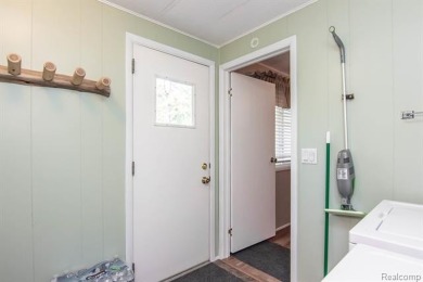 This well cared for ranch style home at Lost Lake Woods Club on Lost Lake Woods Club in Michigan - for sale on GolfHomes.com, golf home, golf lot