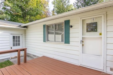 This well cared for ranch style home at Lost Lake Woods Club on Lost Lake Woods Club in Michigan - for sale on GolfHomes.com, golf home, golf lot