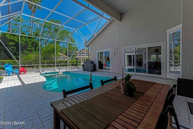 Welcome to this timeless and well-loved 3-bedroom, 2-bathroom on Plantation Bay Golf and Country Club in Florida - for sale on GolfHomes.com, golf home, golf lot