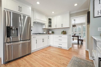 Welcome to 1514 Mosswood Lane--a beautifully updated 4-bed, 3 on Canongate At Eagle Watch Golf Club in Georgia - for sale on GolfHomes.com, golf home, golf lot