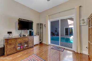 Welcome to this timeless and well-loved 3-bedroom, 2-bathroom on Plantation Bay Golf and Country Club in Florida - for sale on GolfHomes.com, golf home, golf lot