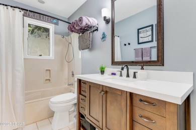 Welcome to this timeless and well-loved 3-bedroom, 2-bathroom on Plantation Bay Golf and Country Club in Florida - for sale on GolfHomes.com, golf home, golf lot