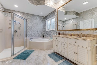 Welcome to this timeless and well-loved 3-bedroom, 2-bathroom on Plantation Bay Golf and Country Club in Florida - for sale on GolfHomes.com, golf home, golf lot