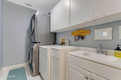 Welcome to this timeless and well-loved 3-bedroom, 2-bathroom on Plantation Bay Golf and Country Club in Florida - for sale on GolfHomes.com, golf home, golf lot