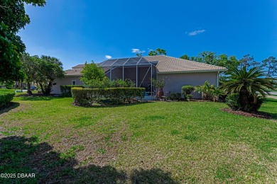 Welcome to this timeless and well-loved 3-bedroom, 2-bathroom on Plantation Bay Golf and Country Club in Florida - for sale on GolfHomes.com, golf home, golf lot