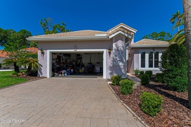 Welcome to this timeless and well-loved 3-bedroom, 2-bathroom on Plantation Bay Golf and Country Club in Florida - for sale on GolfHomes.com, golf home, golf lot