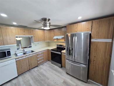 PRICE REDUCED!!!  Welcome to Wynmoor, Coconut Creek's premier on Wynmoor Golf Course in Florida - for sale on GolfHomes.com, golf home, golf lot