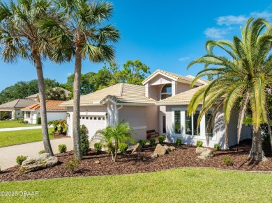 Welcome to this timeless and well-loved 3-bedroom, 2-bathroom on Plantation Bay Golf and Country Club in Florida - for sale on GolfHomes.com, golf home, golf lot