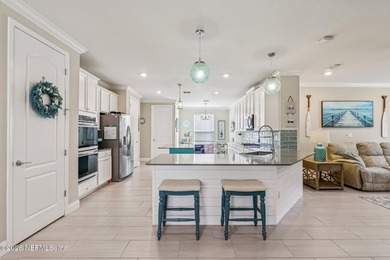 WOW! Experience coastal luxury in this 4BR, 3BA waterfront on The Palencia Club in Florida - for sale on GolfHomes.com, golf home, golf lot