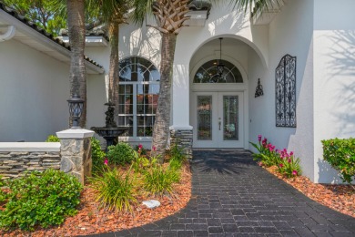 NEW BLACK TILED ROOF (4/24) and a circular driveway with black on Emerald Bay Golf Club in Florida - for sale on GolfHomes.com, golf home, golf lot