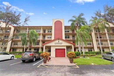 SPACIOUS UNIT WITH ACCORDIAN SHUTTERS AND A SCREENED BALCONY on Flamingo Lakes Country Club in Florida - for sale on GolfHomes.com, golf home, golf lot