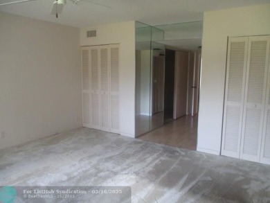 Spacious 2-Bedroom, 2-Bath Unit with Serene Golf Course Views! on Woodmont Country Club in Florida - for sale on GolfHomes.com, golf home, golf lot