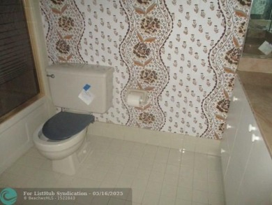 Spacious 2-Bedroom, 2-Bath Unit with Serene Golf Course Views! on Woodmont Country Club in Florida - for sale on GolfHomes.com, golf home, golf lot