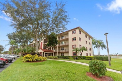 SPACIOUS UNIT WITH ACCORDIAN SHUTTERS AND A SCREENED BALCONY on Flamingo Lakes Country Club in Florida - for sale on GolfHomes.com, golf home, golf lot